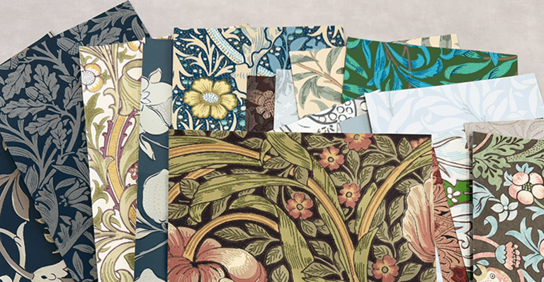 ウィリアム・モリスの壁紙デザインを集めたサンプルイメージ。草花や葉をモチーフにした多彩なパターンと配色の壁紙が重ねて並べられており、デザインや色味の違いを比較・検討できるコーディネート用サンプル。